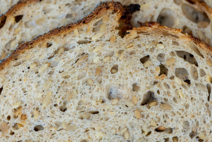 totally even dispersion of seeds in the cumb of this seeded sourdough bread