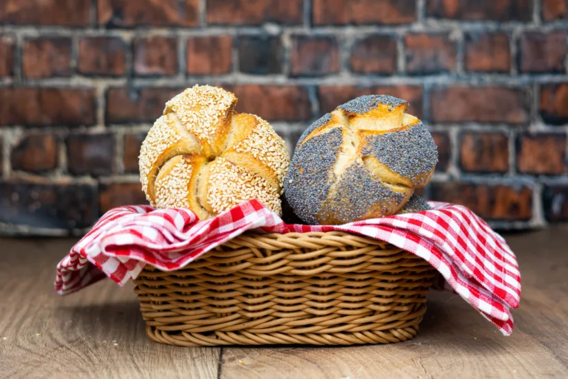 Sourdough kaiser rolls in a bread basket