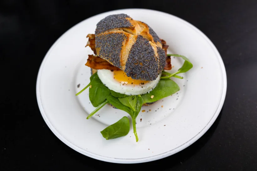 Poppy seed Kaiser roll with egg and bacon