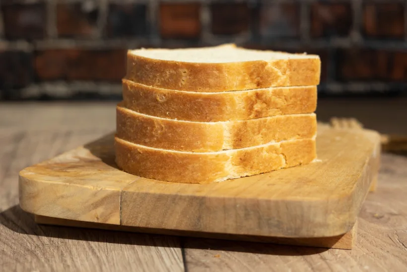 Sliced Homemade Wonder Bread on a board